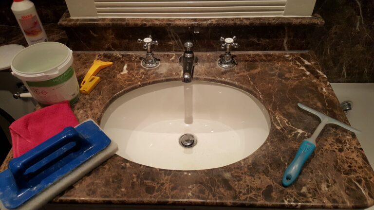 Marble Vanity Top with Light Limescale Damage