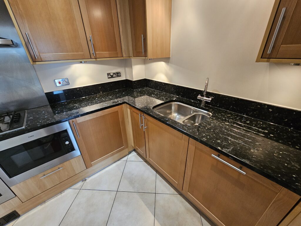 CLEANED, SEALED AND POLISHED BLUE PEARL GRANITE KITCHEN WORKTOP