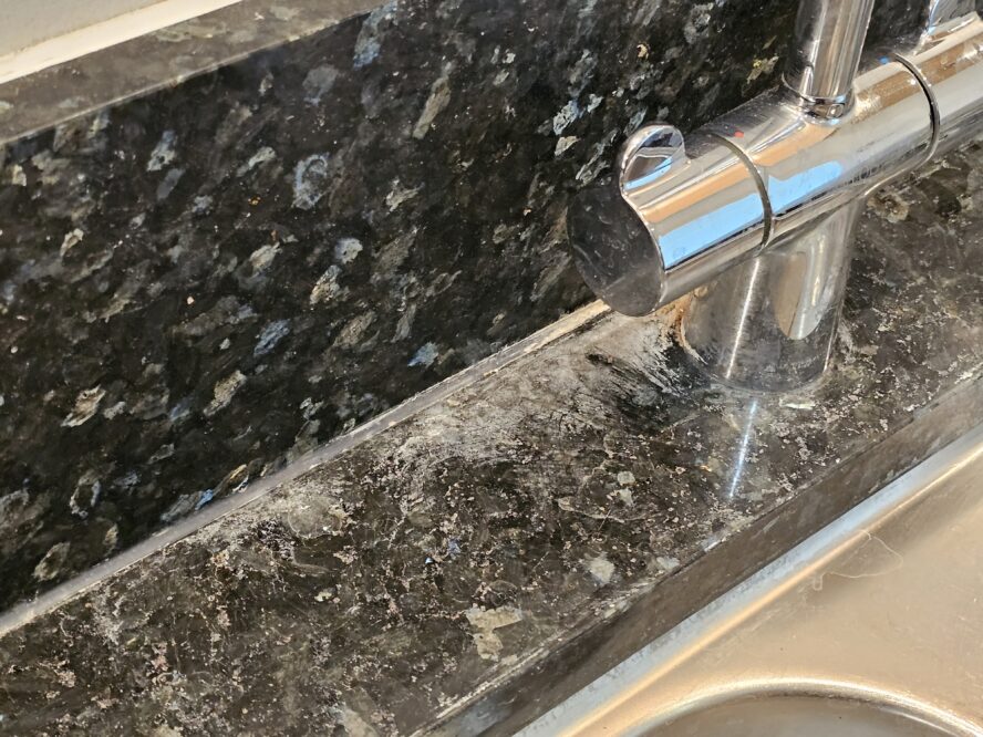 Limescale on Blue Pearl Granite